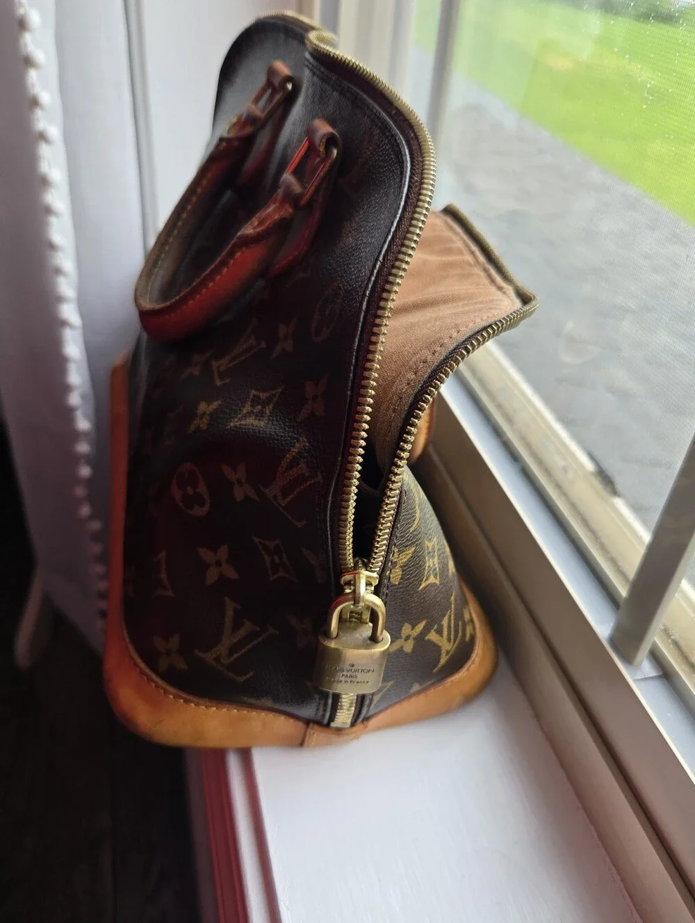 Louis Vuitton Brown Monogram Alma Handbag